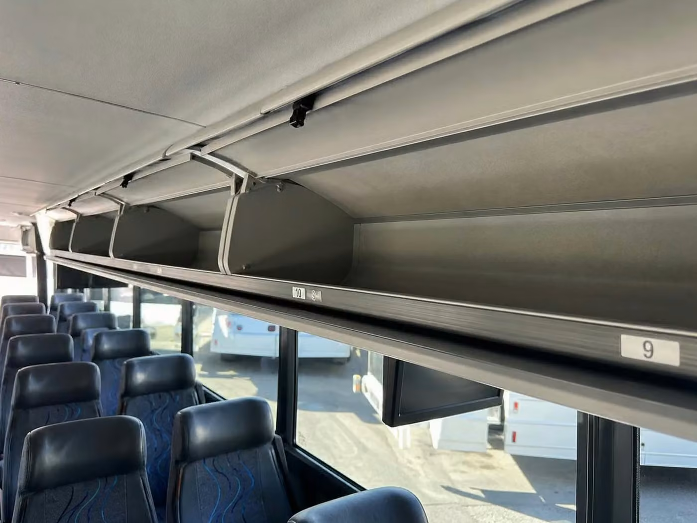 hinesville 56 passenger charter bus overhead storage